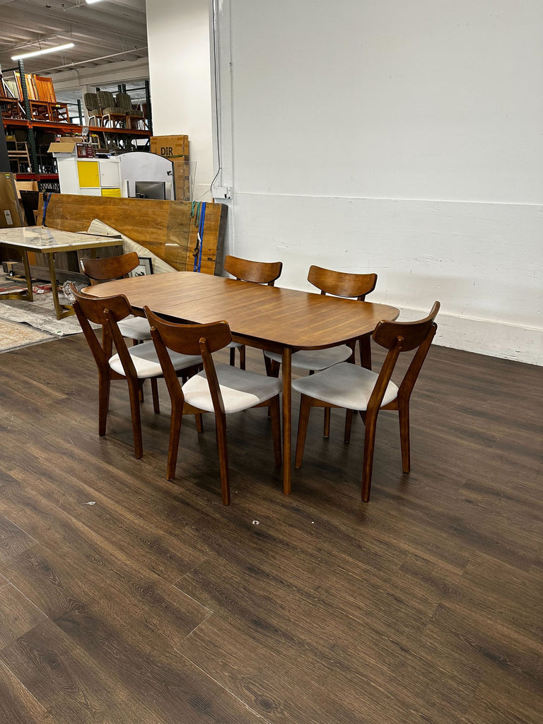 Mid-century modern dining table with 6 chairs.