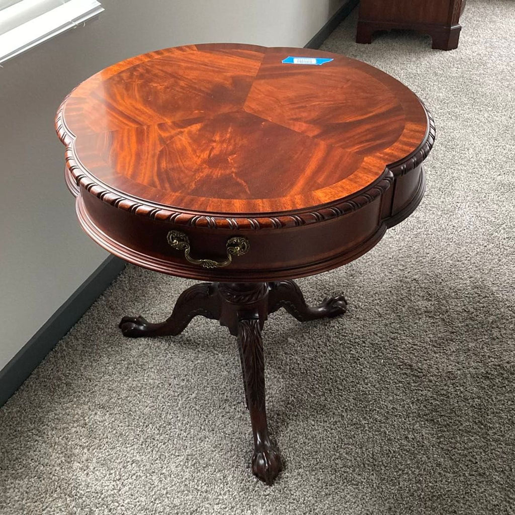 Elegant Henkel-Harris console table featuring a clover top, mahogany finish, classic pedestal, and storage drawer.