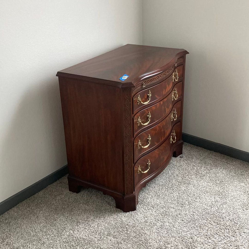 Elegant Henkel-Harris dresser, rich mahogany finish, detailed woodwork, and spacious drawers for stylish bedroom storage.  