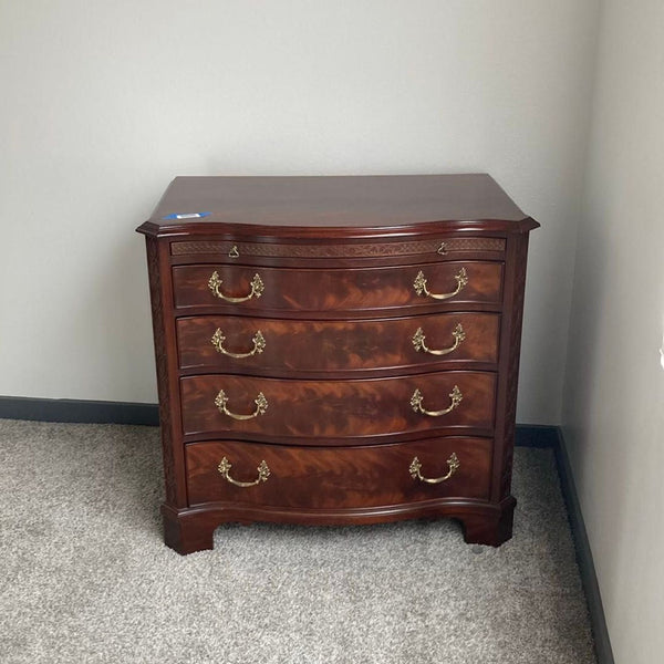 Henkel-Harris mahogany dresser with four drawers, brass handles, and classic bow front design in excellent condition.  