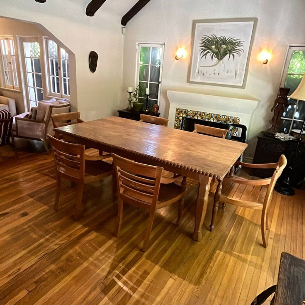 Classic dining set: sturdy wooden table, five armchairs with supportive backs, minor repair needed on one seat.