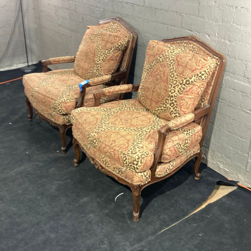 Set of two classic lounge chairs by Sherrill Furniture, featuring wooden frames and elegant patterned upholstery.  