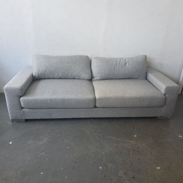 Light gray Ben Soleimani 3-seat sofa with square arms and supportive cushions, shown in gently used condition.