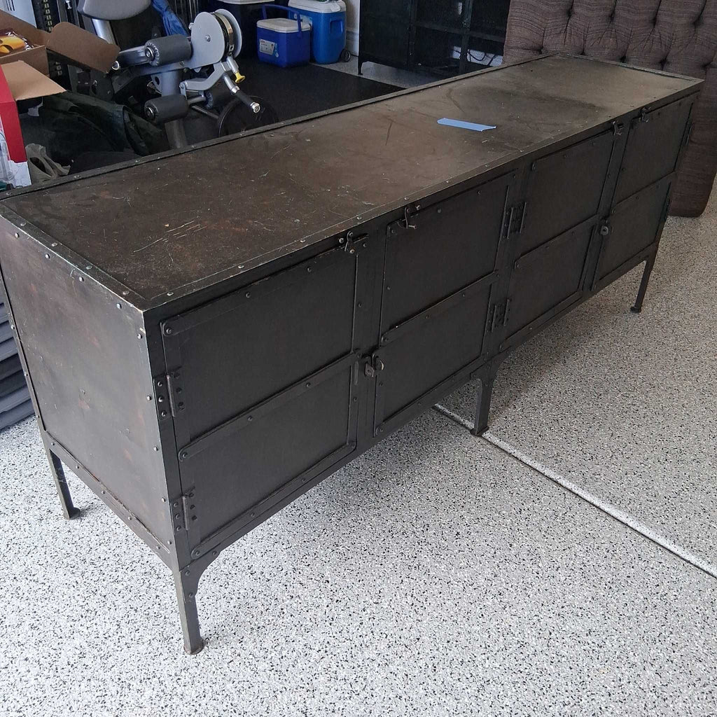 Sturdy credenza with six doors, including mesh fronts, suitable for living, dining, or office spaces.