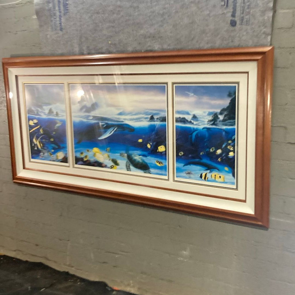 Ocean-themed triptych painting with marine animals, set in a wooden double-matted frame, ready to hang.