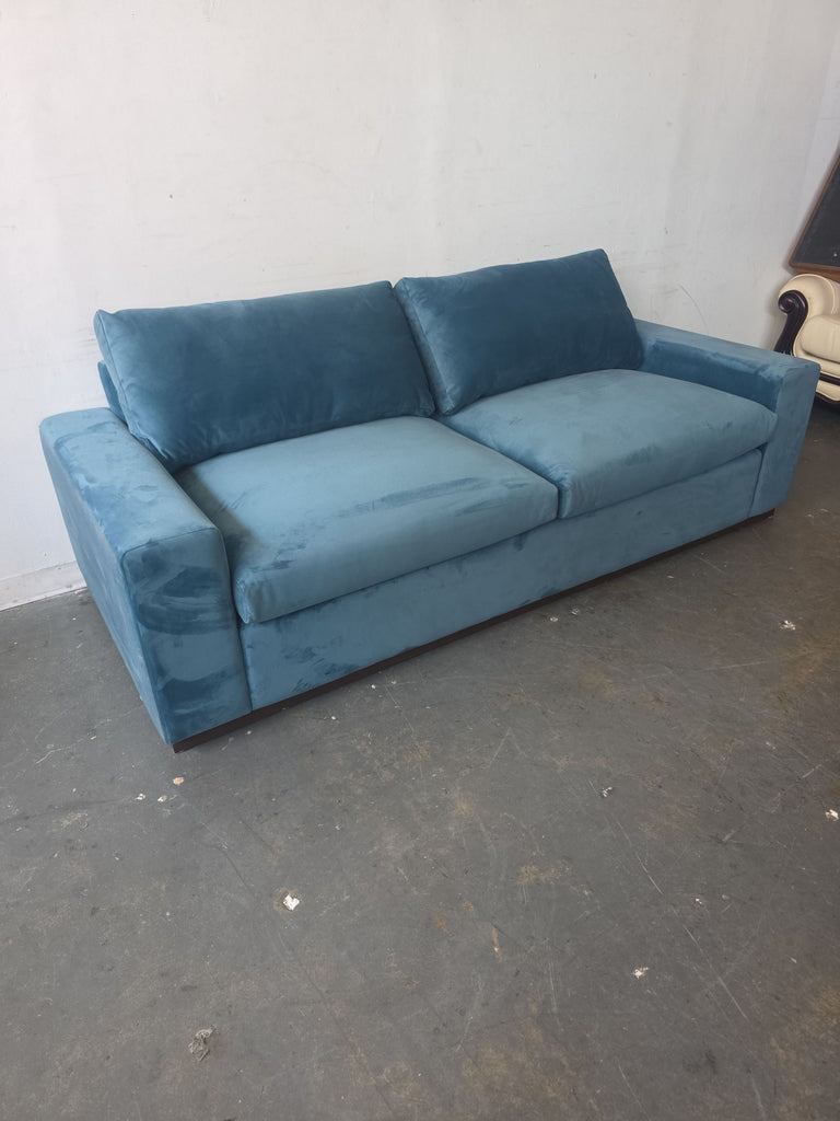 Modern Joybird blue sleeper sofa with velvet upholstery, wide arms, and comfort for two; gently used.  