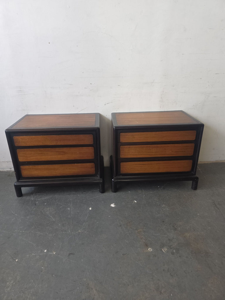 Pair of vintage John Stuart for Mount Airy nightstands with three drawers and black frames, mid-century modern style.