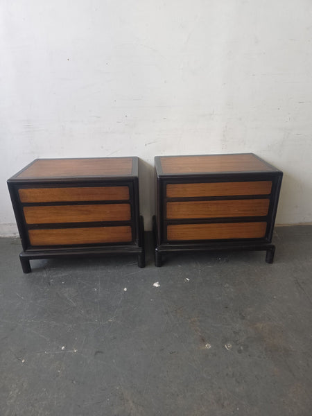 Pair of vintage John Stuart for Mount Airy nightstands with three drawers and black frames, mid-century modern style.