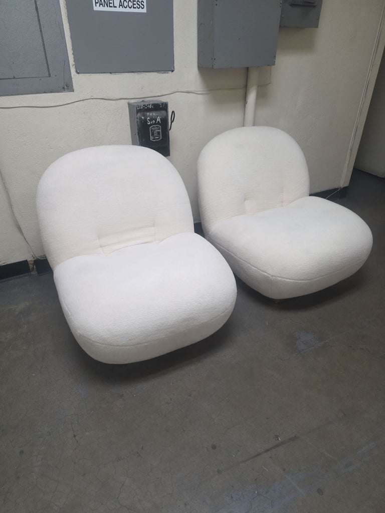 Two gently used contemporary lounge chairs by VIG Furniture, featuring cozy cream seats and wide armrests.
