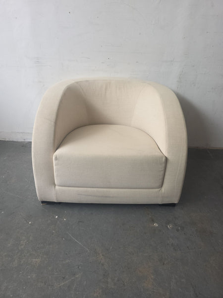 Beige Armani Casa lounge chair with a curved back and modern design, ideal for stylish living rooms.