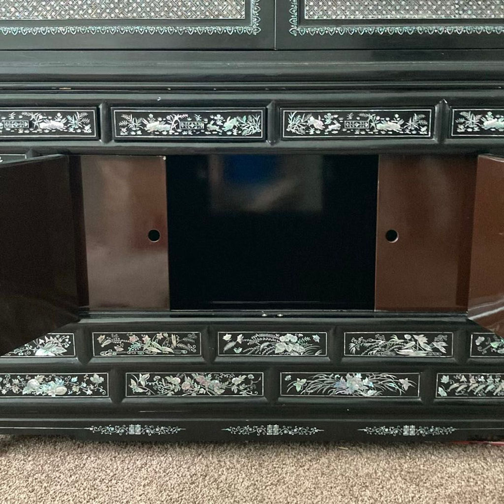 Elegant Black Asian Cabinet with Mother of Pearl Inlay and Crane Design