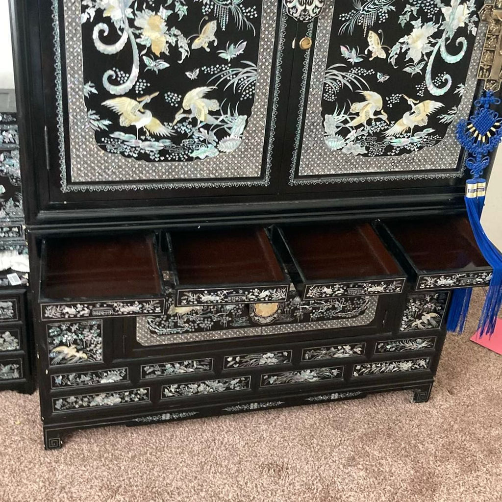 Elegant Black Asian Cabinet with Mother of Pearl Inlay and Crane Design