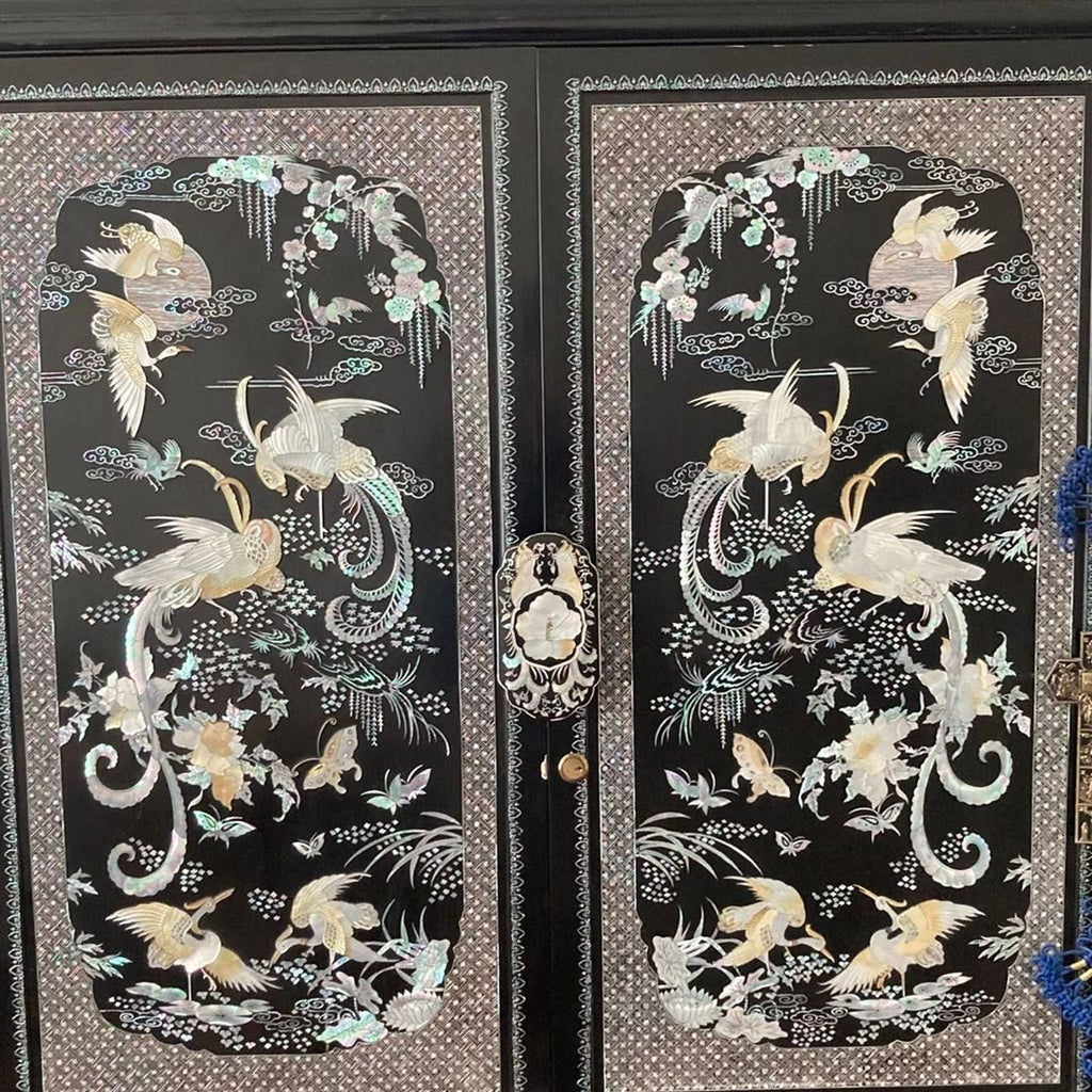 Elegant Black Asian Cabinet with Mother of Pearl Inlay and Crane Design