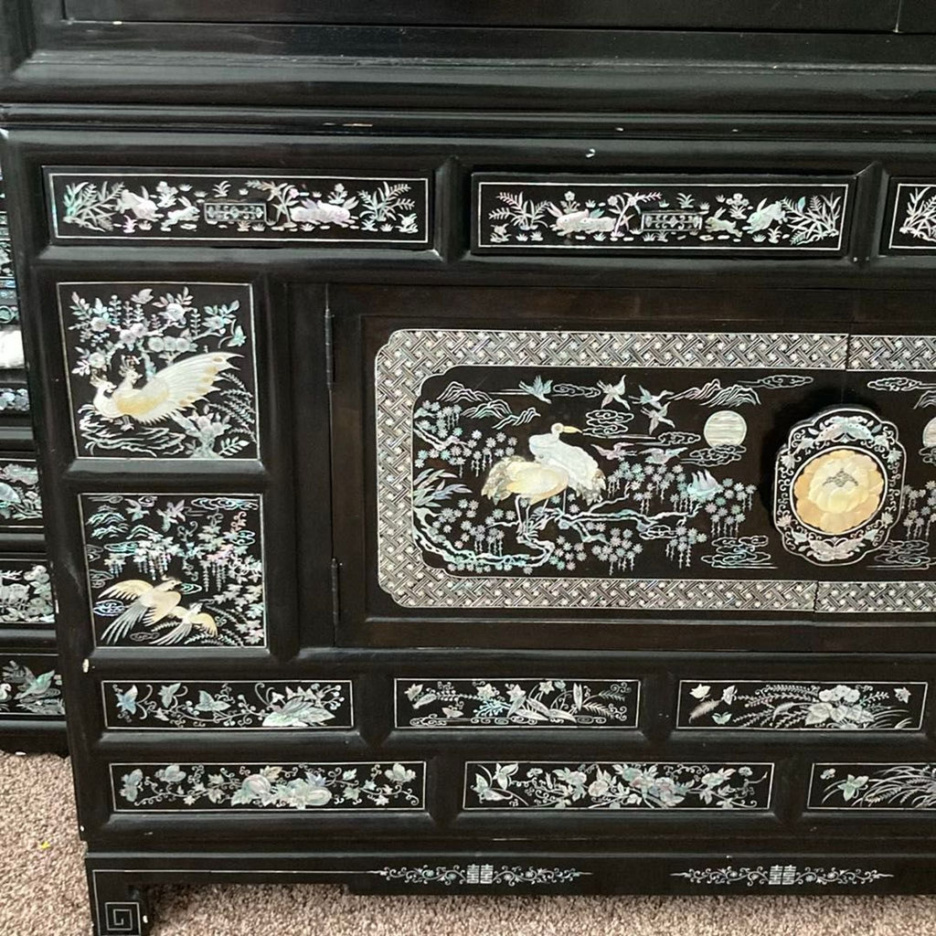 Elegant Black Asian Cabinet with Mother of Pearl Inlay and Crane Design