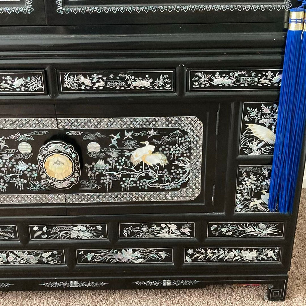 Elegant Black Asian Cabinet with Mother of Pearl Inlay and Crane Design