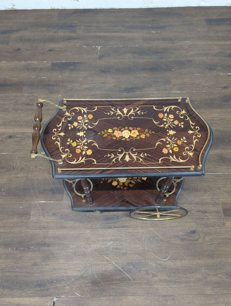 Wooden entertainment center with folding end table