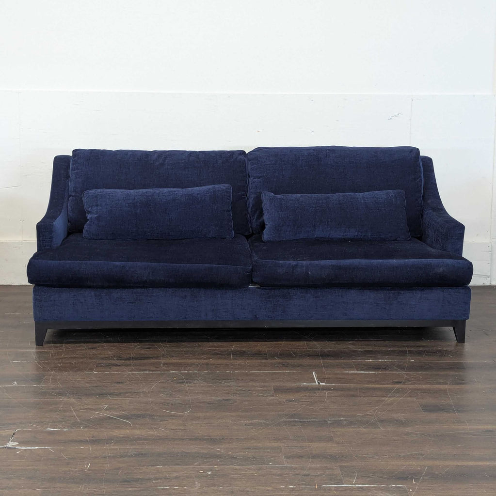 Custom-made 3-seater in vibrant blue from The Jones; sturdy, comfortable, and perfect for living rooms.