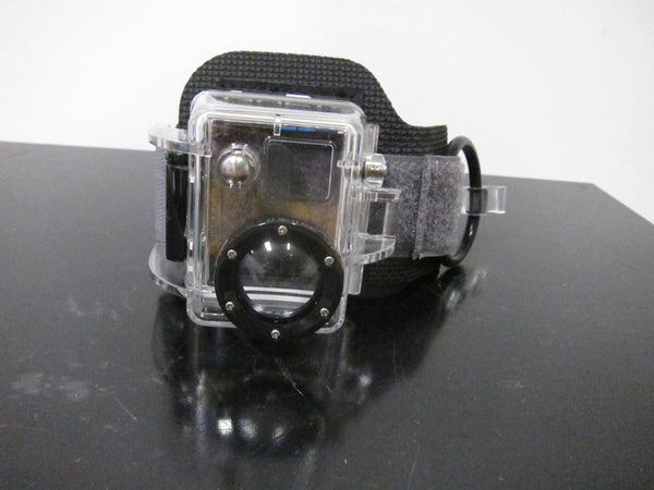 1. Clear GoPro Wrist Housing by Reperch with a black adjustable strap, placed on a reflective surface.