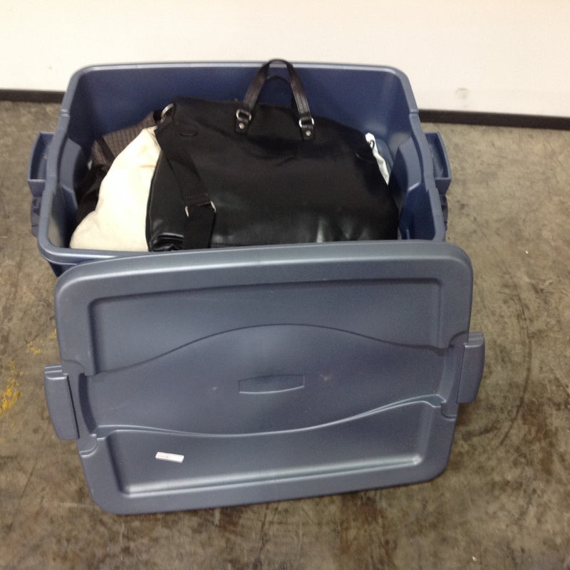 2. Multiple purses, including a black one, inside a large blue container from the brand Reperch.