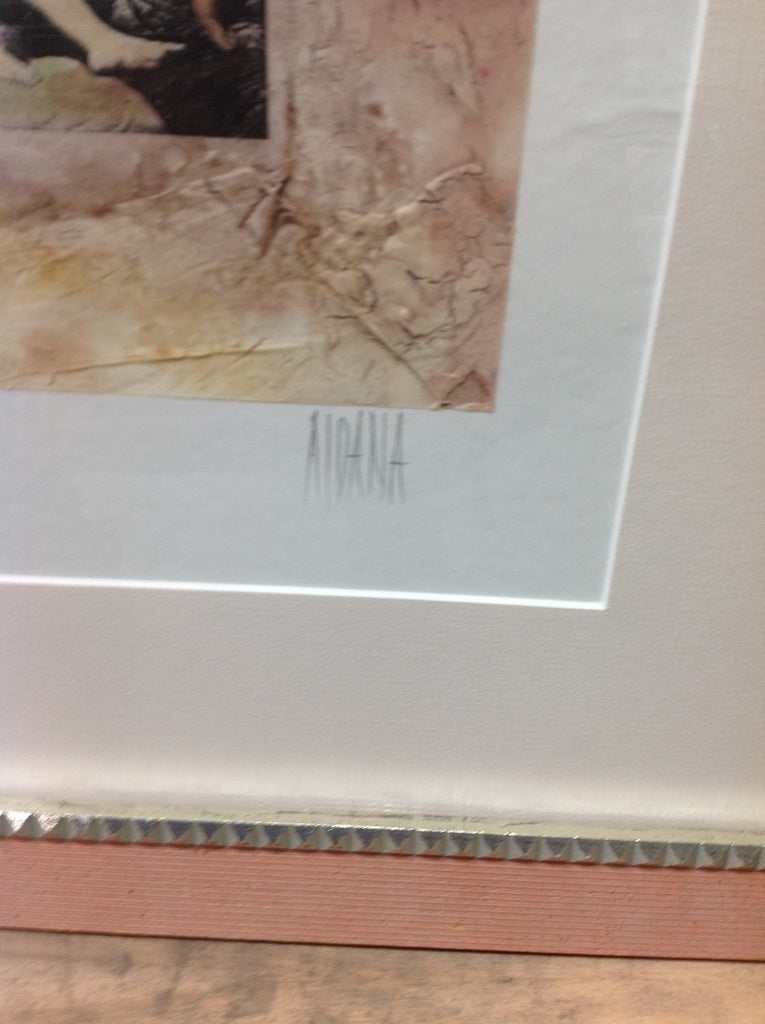 3. Signature detail of artist on Reperch art print "Angels Sleeping", with textured peach-toned border in frame.