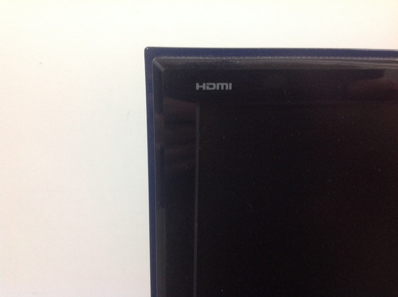 3. Detailed image of the top left corner of an Asus monitor, featuring the HDMI label on the frame.