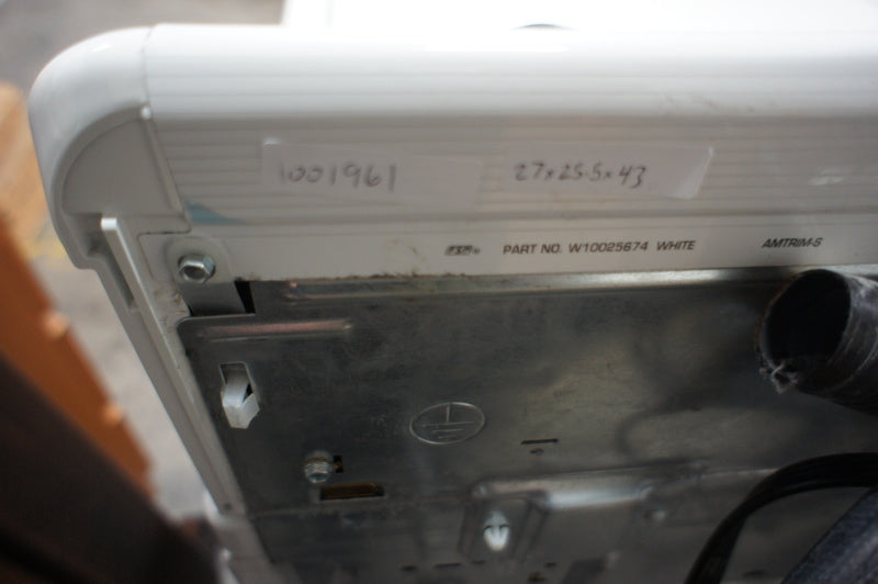 3. Detailed image of Kenmore dryer's rear with serial numbers and part information visible above connection ports.