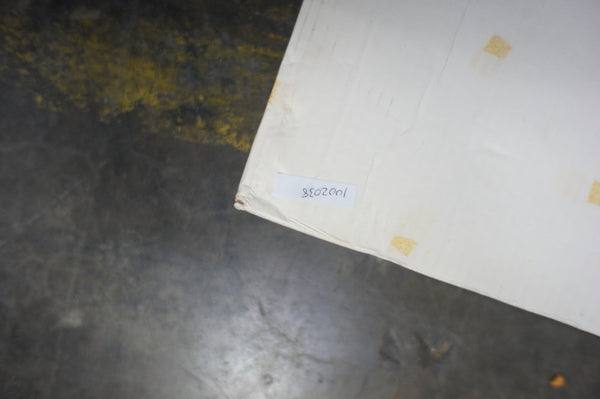 1. Closeup of a corner of a white Keepsake Pak box with a label, containing a vintage wedding dress by Reperch.  