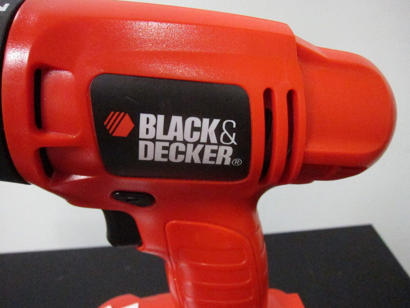 3. Detailed view of the Black & Decker logo on the side of the red cordless drill.