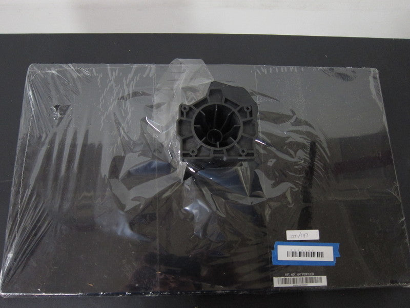 3. Overhead view of Reperch PDP/LED Television Stand, black rectangular base with plastic mount and inventory tags.