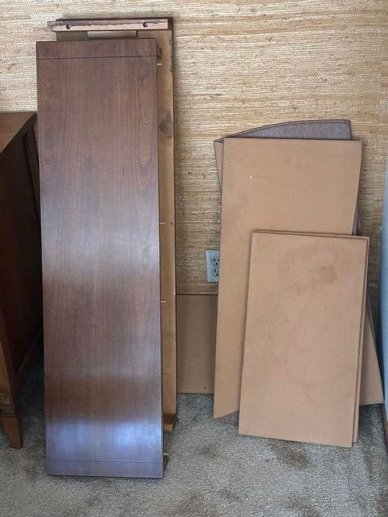 1. Elegant Thomasville hutch and armoire with glass-paneled doors and wooden finish, perfect for dining storage.