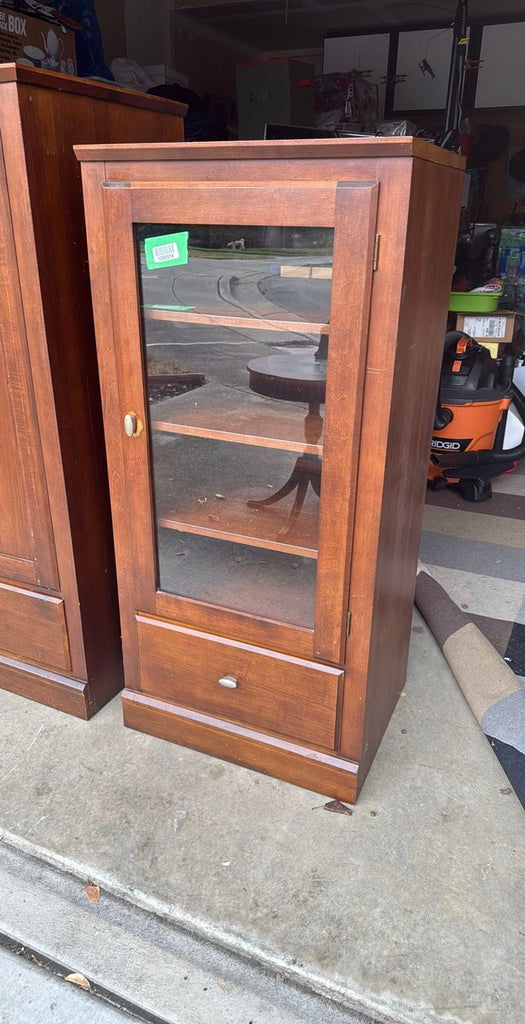 Solid wood Ethan Allen cabinet, ideal for storage, shown with a smooth finish and elegant styling.  