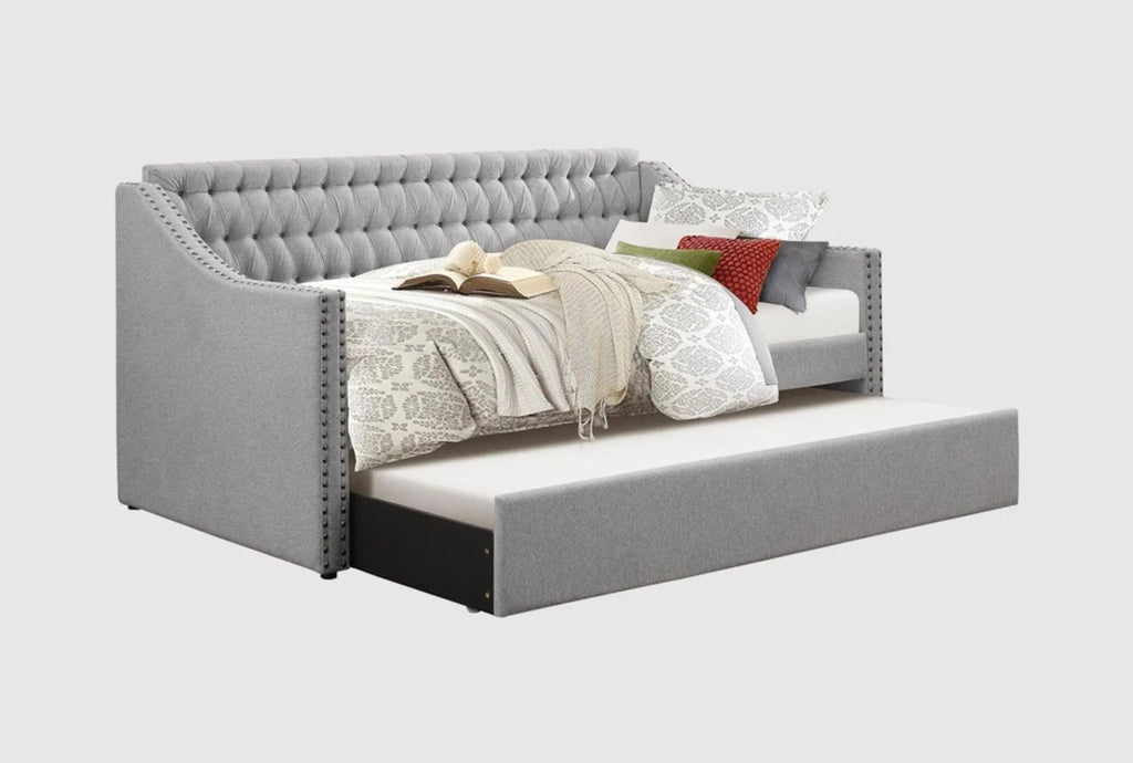 RH Baby and Child tufted daybed, a cozy and chic sleeper sofa perfect for children's spaces.  