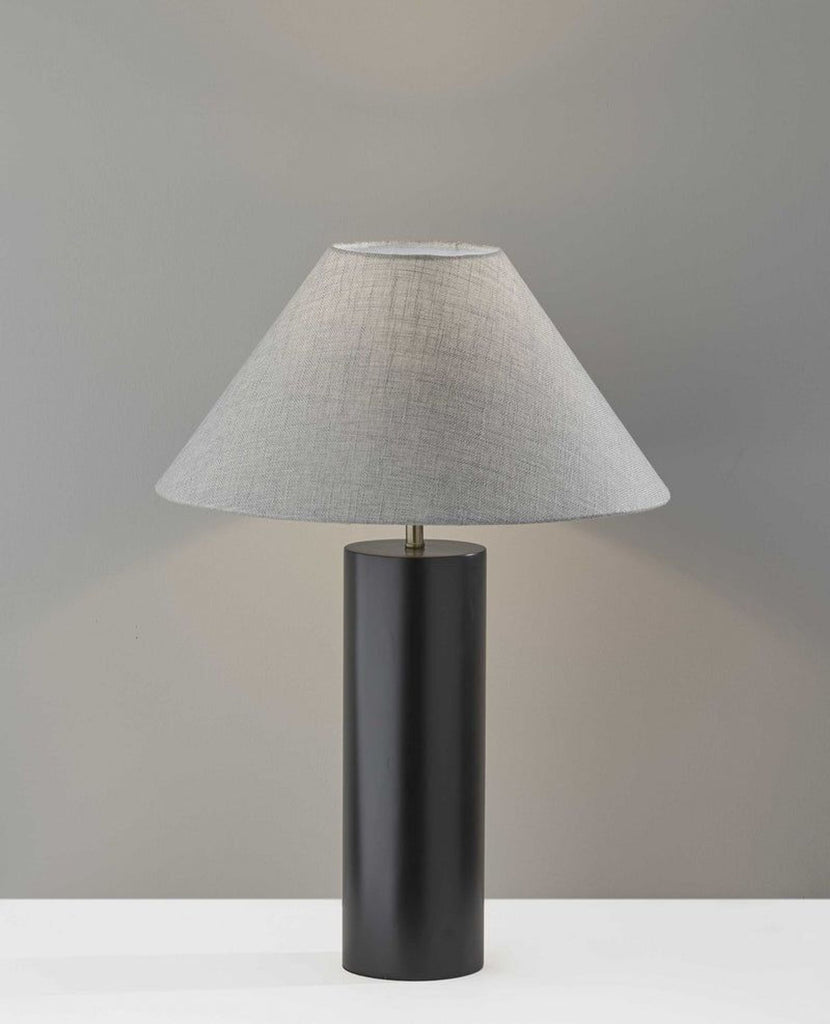 the table lamp is a modern, contemporary lamp with a matte black base and a matte