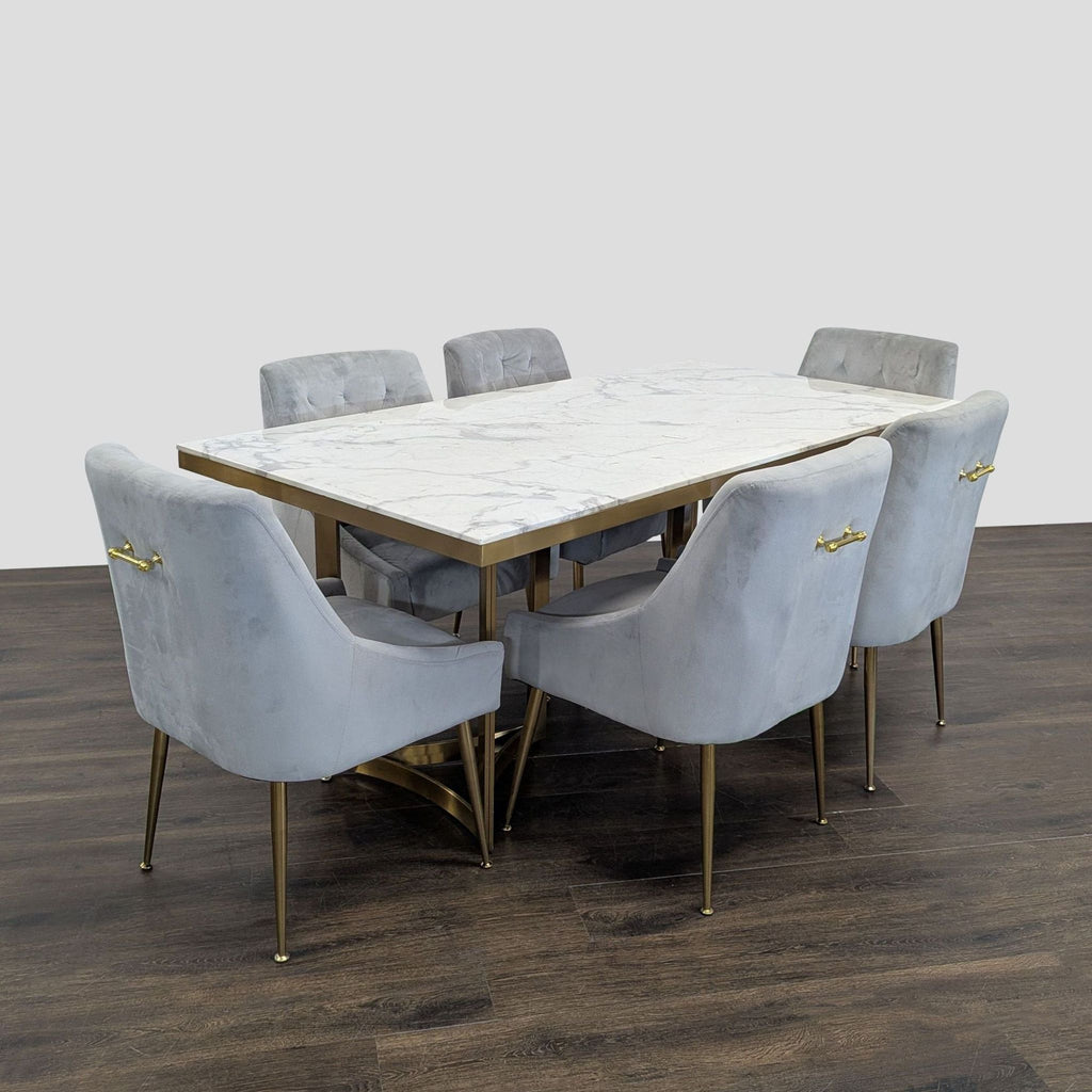 Wayfair 7-piece dining set featuring a marble-look table with gold base and six gray velvet chairs.
