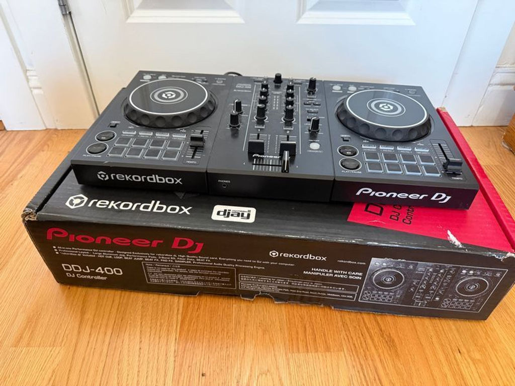 Pioneer DJ DDJ-400 controller in good condition, with all buttons and knobs visible, for audio equipment use.  