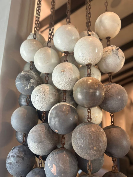 Close-up showing both sides of a Hanging Art sculpture by Kelly Farley with intricate details.  