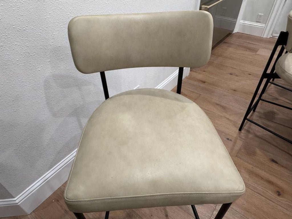 1. Pottery Barn Maison Leather Barstool featuring a sleek leather seat and wooden legs, ideal for kitchen islands.