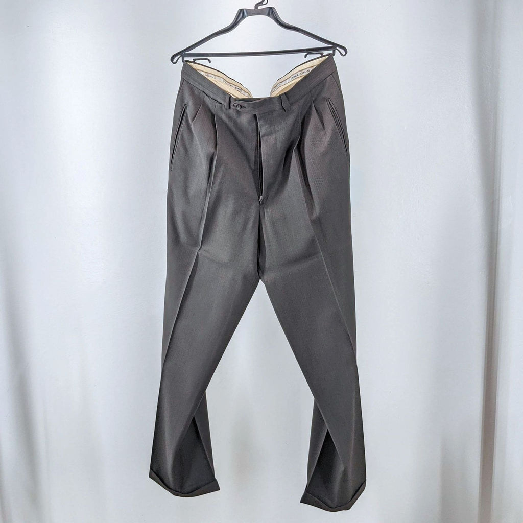 Giorgio Armani men's trousers in dark material on a hanger.