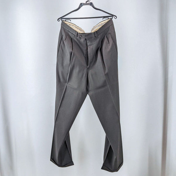 Giorgio Armani men's trousers in dark material on a hanger.