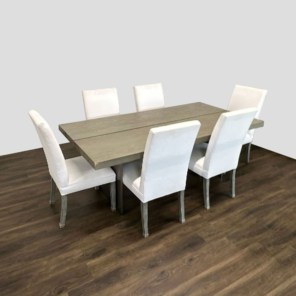 Modern dining set featuring a sturdy light-finished table and six plush white chairs; ideal for any dining area.
