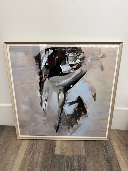 Framed art print displayed against a plain background, showcasing its elegant black frame.