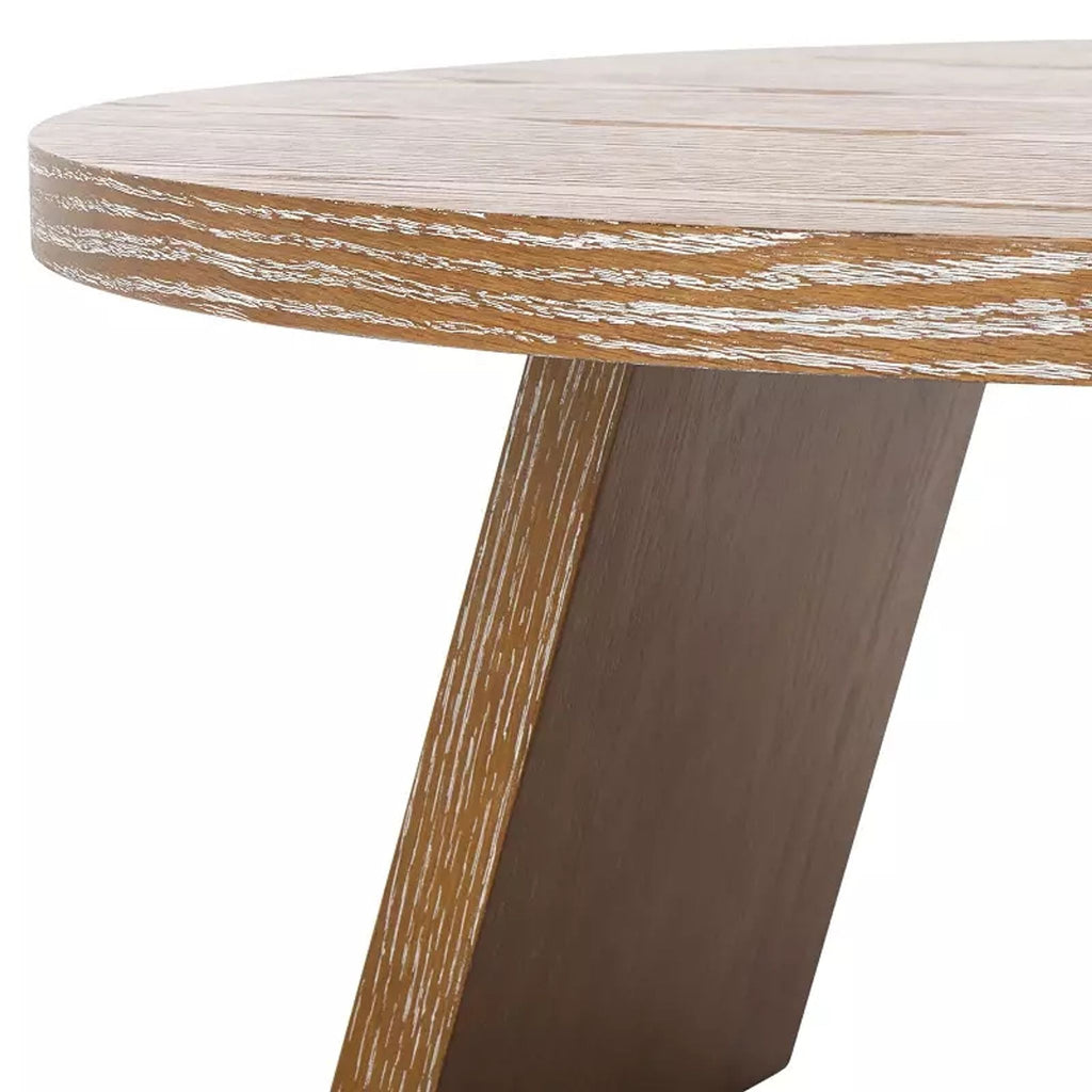 3. Close-up detail of Reperch coffee table leg and edge, emphasizing the wood grain and craftsmanship.
