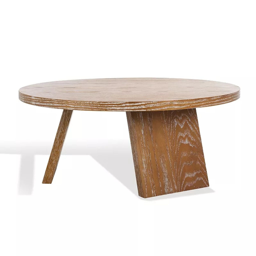 2. Side view of Reperch coffee table, highlighting its circular wooden top and distinctive slanted base.