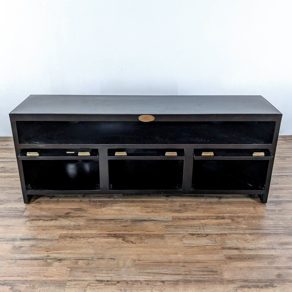 vintage black lacquer sideboard with brass handles and a shelf.