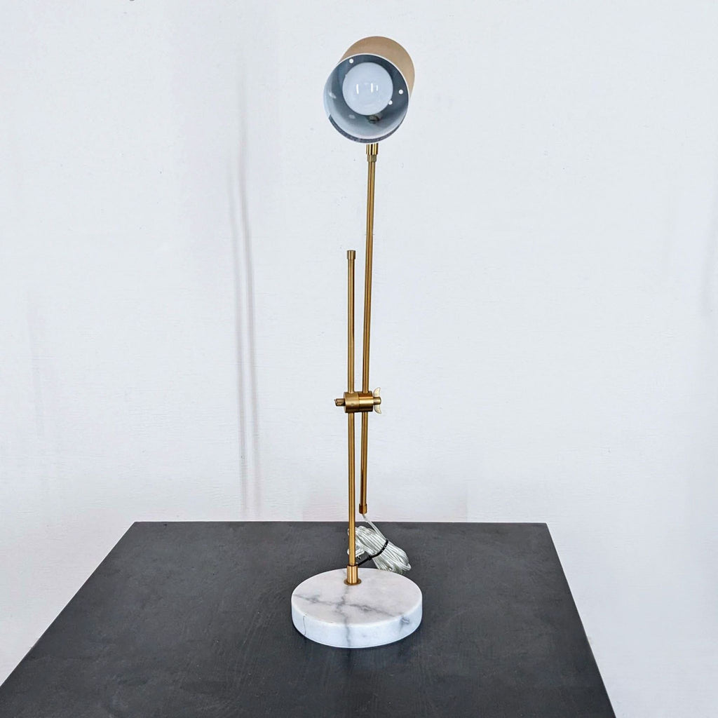 a pair of brass and glass table lamps by [ unused0 ] for [ unused0 ],