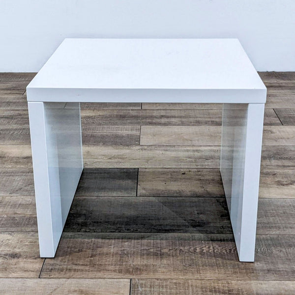 Reperch End Table, white, simplistic design, placed on wood floor.  