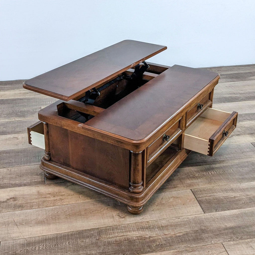 Coffee table with open drawers and split lift-top feature.