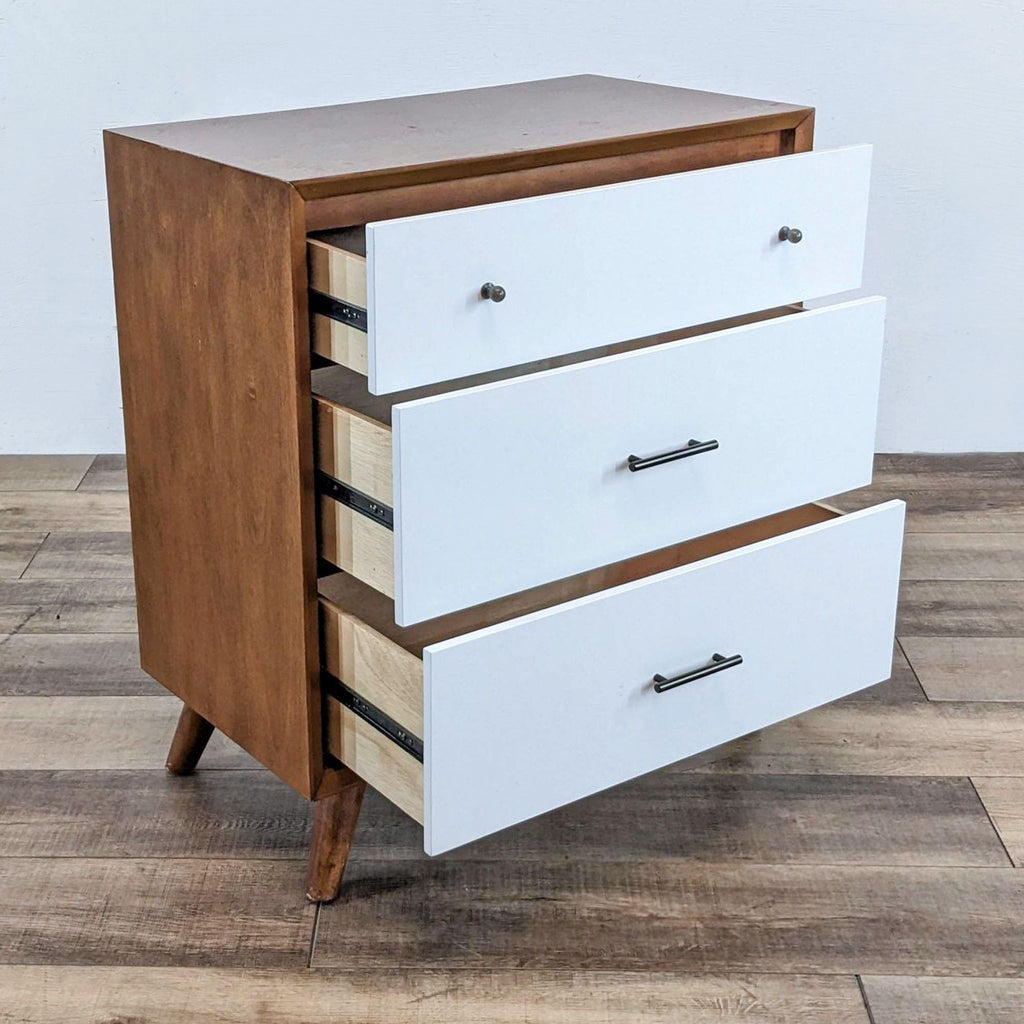 Three-drawer chest from Alpine Furniture, featuring white fronts and wood sides.