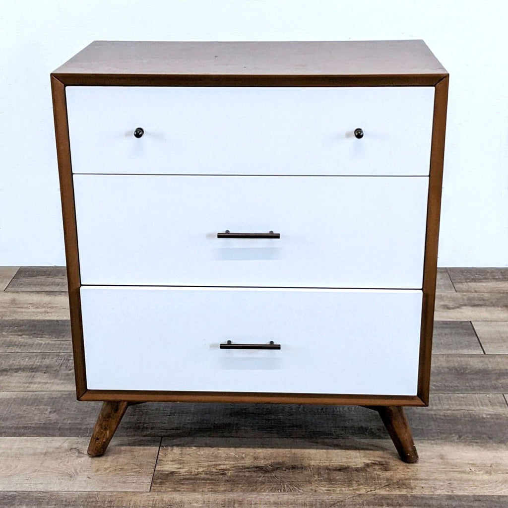 Mid-century modern chest with white drawers and wooden frame, by Alpine Furniture.