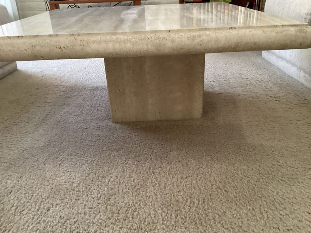 a marble coffee table in the style of [ unused0 ]